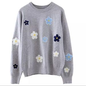 Great spring sweater with floral embroidery